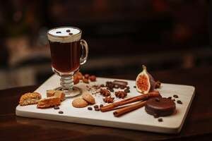 irish coffee with whipped cream in coffee glass
