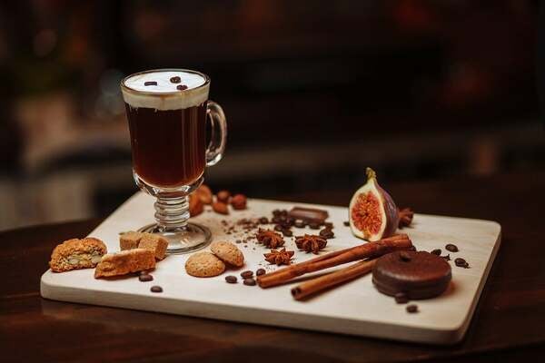 irish coffee with whipped cream in coffee glass