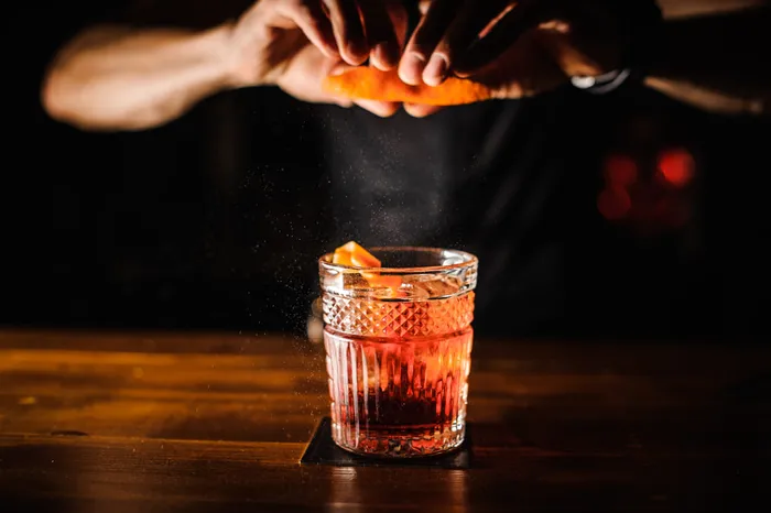 making a cocktail based on whisky